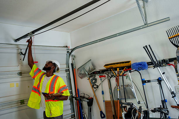 Professional Garage Door Panel Replacement technician working in Spencer, WI